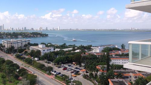 View of city against cloudy sky