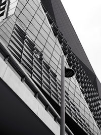 Low angle view of modern building against clear sky