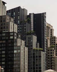 Low angle view of skyscrapers against sky