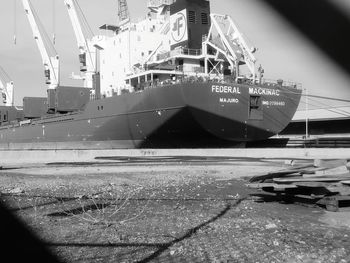 Ship moored at harbor