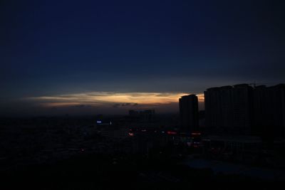 View of cityscape at sunset