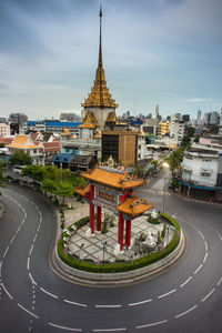 High angle view of street by stupa and buildings in city