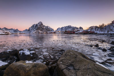 Scenic view of sea against clear sky during sunset