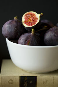 Close-up of fruits in bowl on table