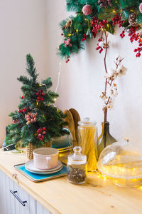 Kitchen interior decorated for christmas and new year. new year's interior in red and white tones