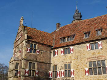 Low angle view of buildings against sky