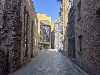 Narrow alley along buildings