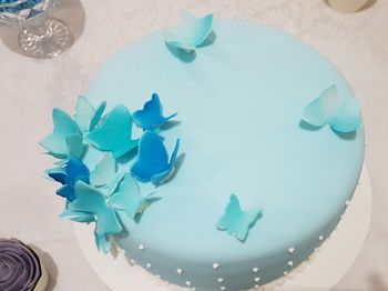 High angle view of multi colored paper on table