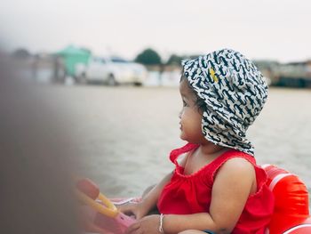 Boy looking at sea shore