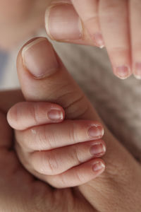 Cropped hand of woman