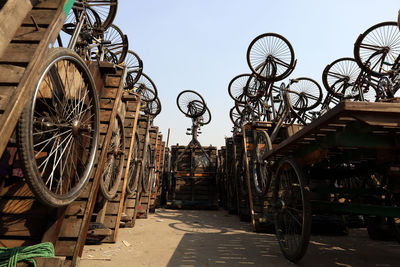 Bicycles parked in city against clear sky