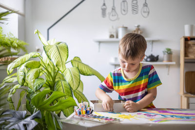 Portrait of cute girl painting