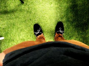 Low section of woman relaxing on floor