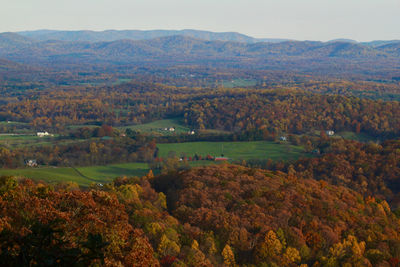 Scenic view of landscape against sky during autumn