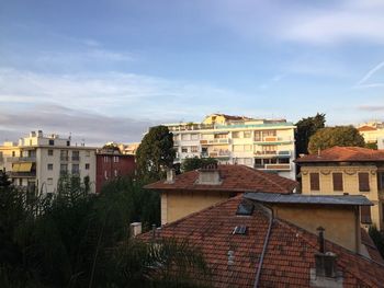 View of residential buildings against sky