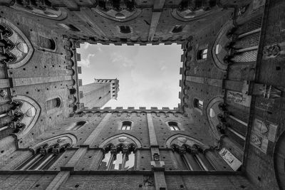 Siena, torre del mangia seen from the internal courtyard.