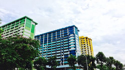 Low angle view of modern building against sky