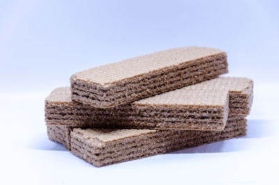 Close-up of stack against white background