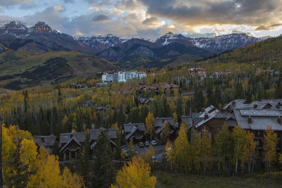 Mountains, hotels, and aspen at sunset above telluride, colorado