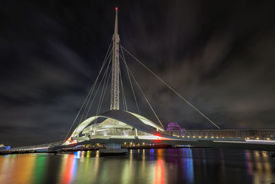 Night view of dagang bridge with seashells and dolphins as design images.beautiful shape,structure. 