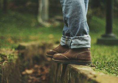Low section of man standing outdoors