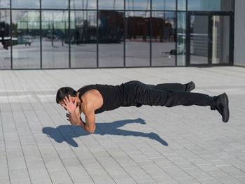 Full length of man exercising outdoors