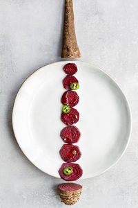 High angle view of fruit in plate on table