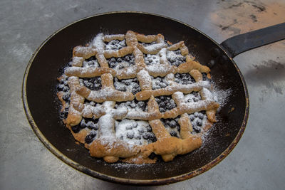 Blueberry pie baked in a pan, cooked in a mobile oven.