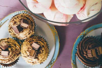 High angle view of cupcakes on table