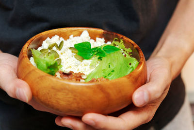 Close-up of hand holding food