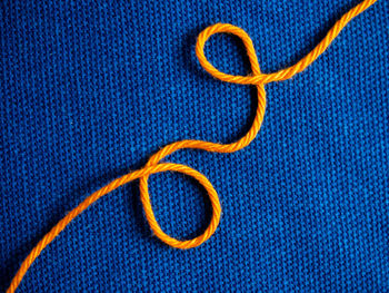 Close-up of drawing on blue background