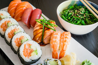 Close-up of sushi served on table