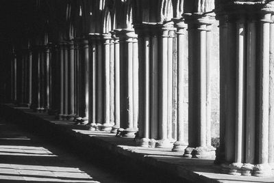 Pillars by walkway at salisbury cathedral