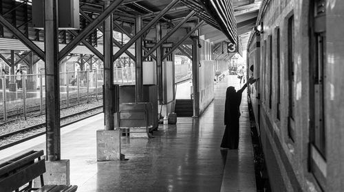 People walking at railroad station