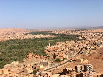 High angle shot of townscape against clear sky