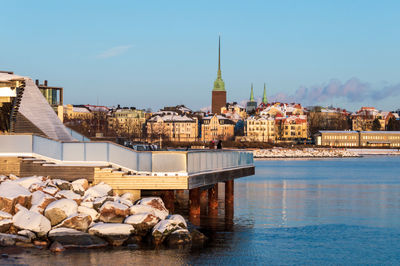 Bridge over river against clear sky