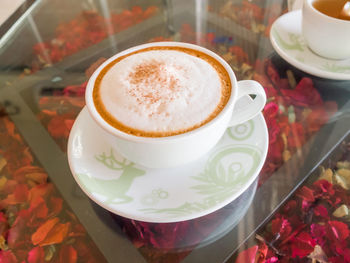 Close-up of coffee cup on table