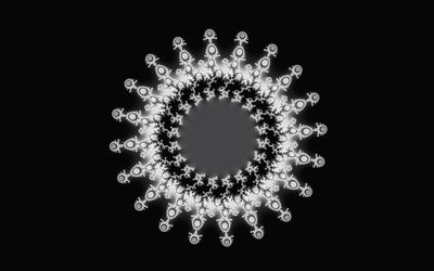 Close-up of chandelier against black background