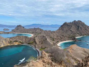 Panoramic view of sea and mountains against sky in labuan bajo indonesia 