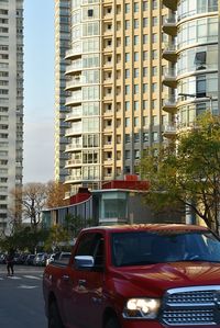 Cars parked in front of apartment building