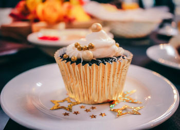 Close-up of cupcakes on table