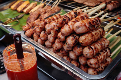 Close-up of grilled meat with red chili sauce, nha trang, vietnam