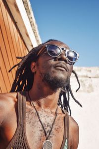 Portrait of young man wearing sunglasses