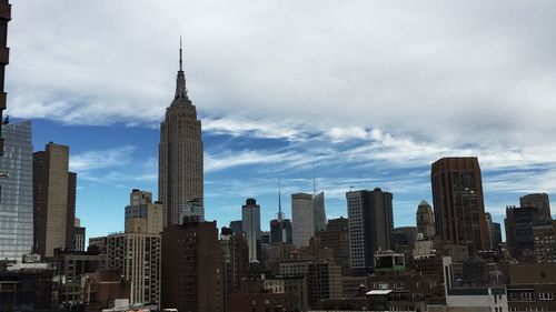 Low angle view of modern buildings against sky