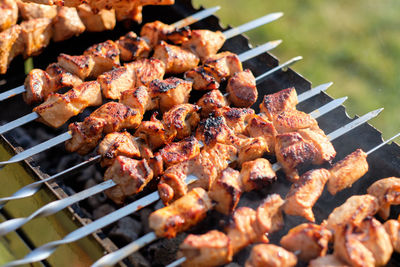 Close-up of meat on barbecue grill