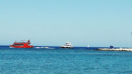 Boat sailing in sea