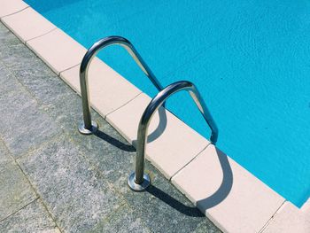 High angle view of ladder at swimming pool