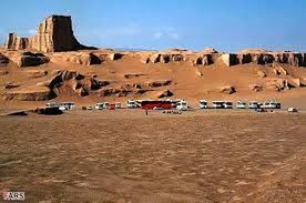 sand, rock formation, desert, travel destinations, tourism, famous place, travel, arid climate, tranquility, clear sky, landscape, tranquil scene, incidental people, sunlight, built structure, sky, scenics, nature, architecture, old ruin