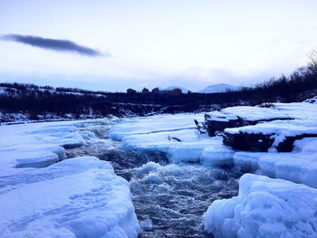 Scenic view of snow covered landscape