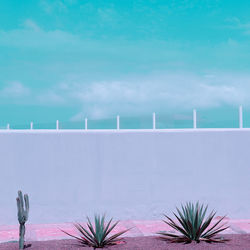 View of swimming pool against blue sky